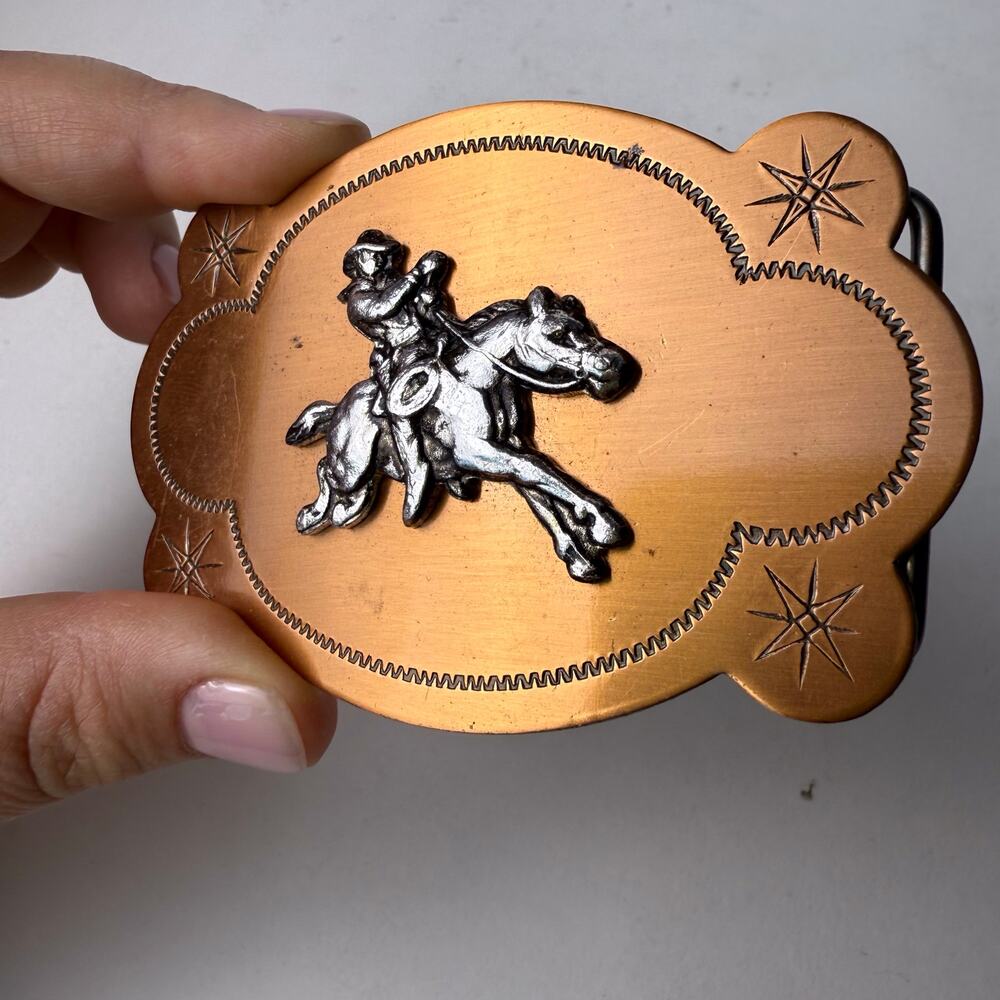 Vintage copper metal cowboy belt buckle